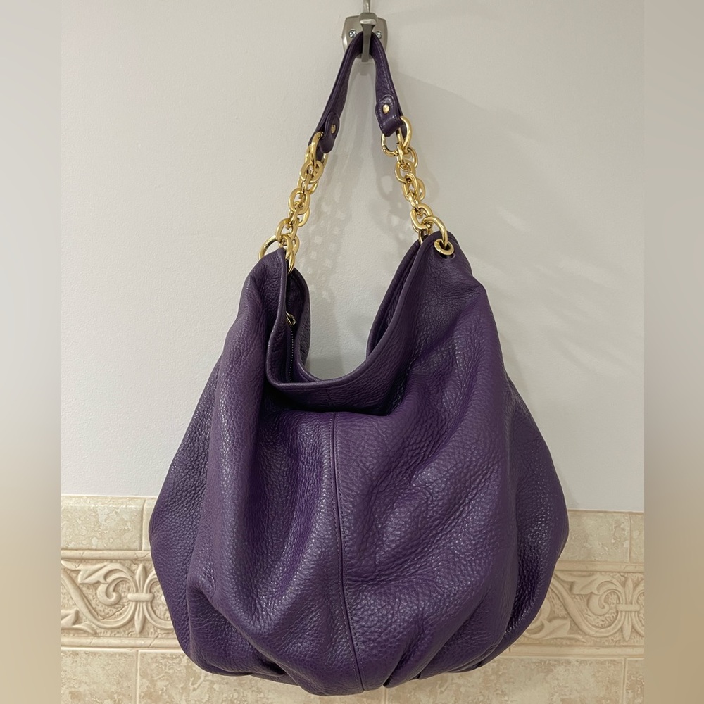 Bodhi leather bucket bag with gold hardware